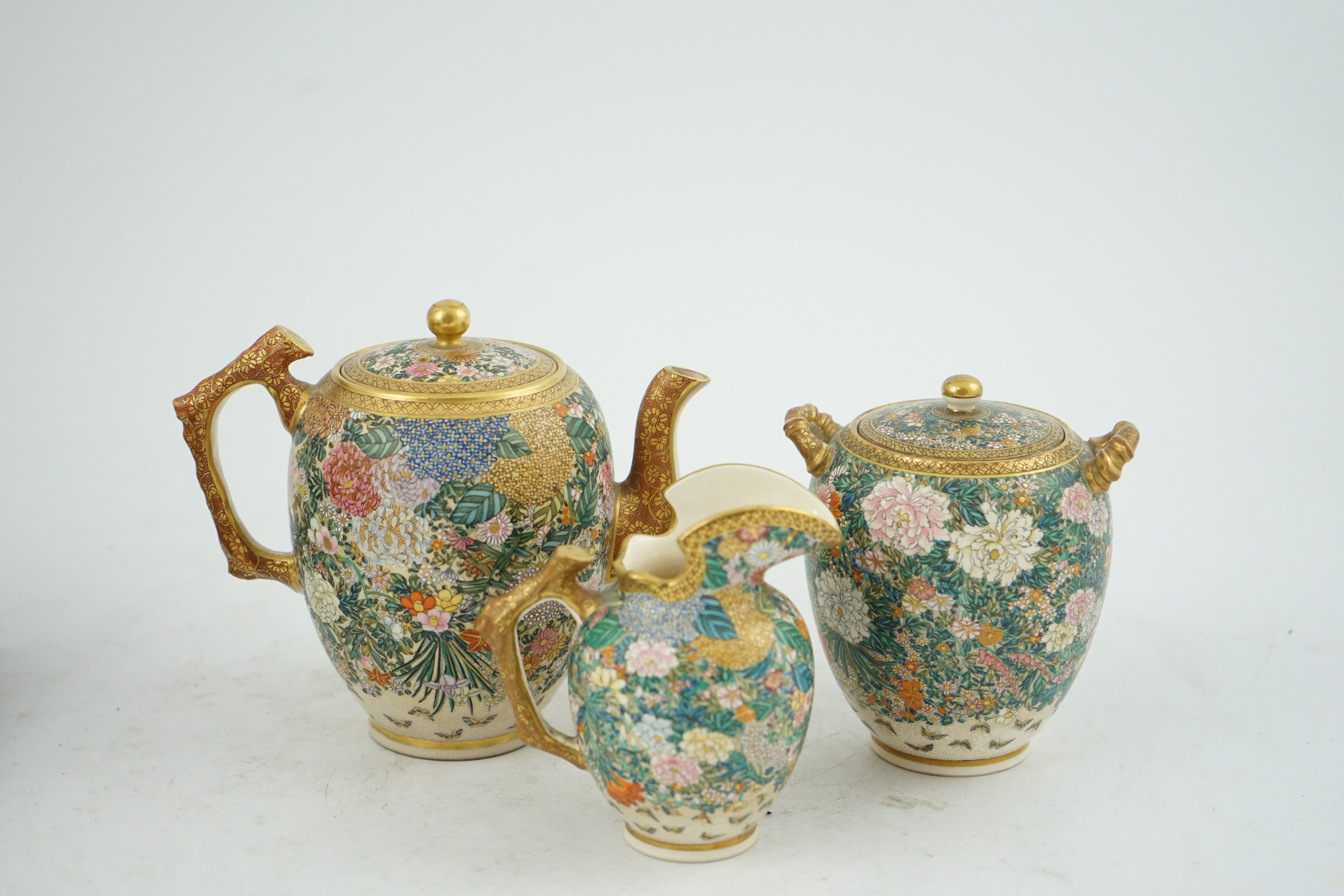 A fine Japanese Satsuma ‘millefleur’ three piece teaset, by Kinkozan, Meiji period